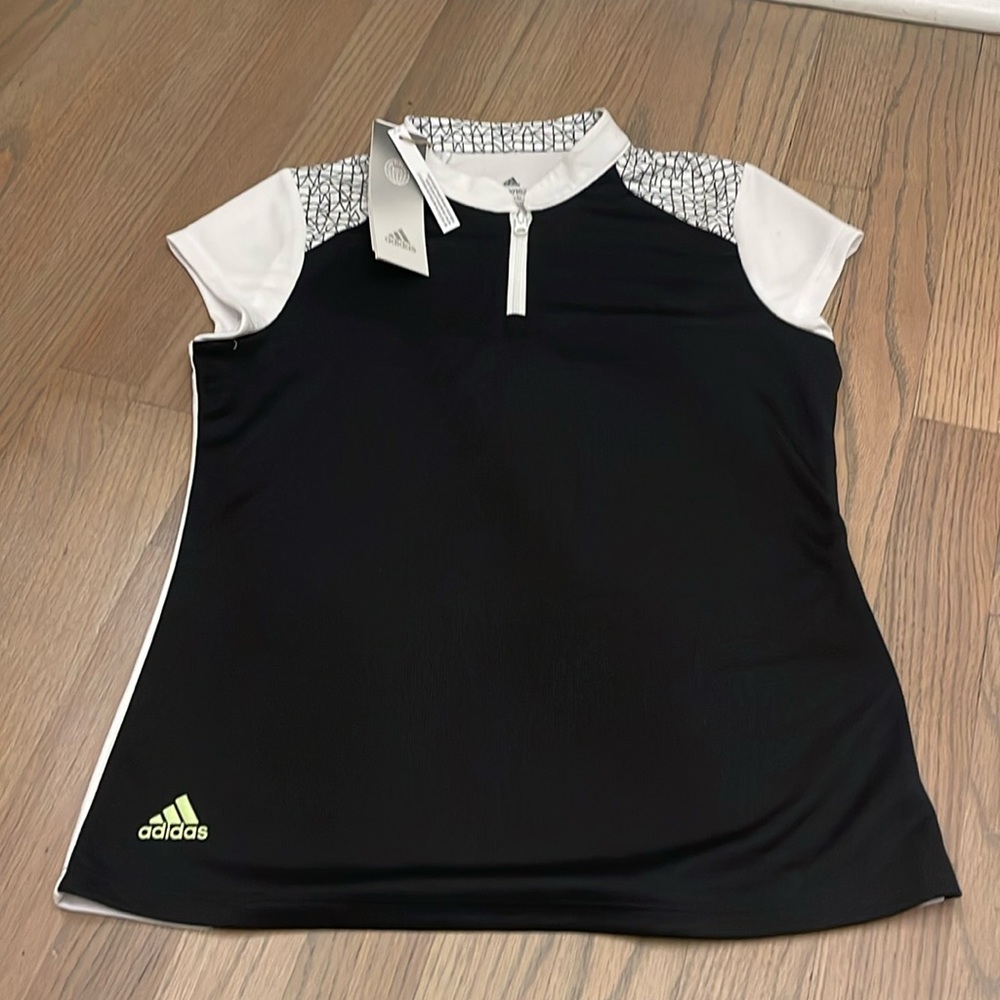 Girls Adidas golf shirt.  NWT.  Size 11-12.